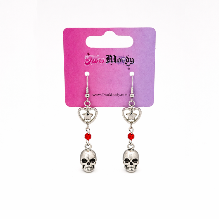 Til Death Do We Sparkle Earrings, red variant, displayed on a Two Moody branded gradient jewelry card.