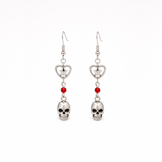 Til Death Do We Sparkle Earrings red variant with silver skull charm and red crystal bead detail.
