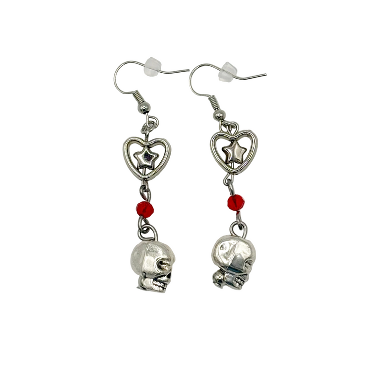 Til Death Do We Sparkle Earrings, red variant, shown from side angle featuring silver skull charm and red crystal bead.
