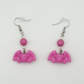 Two Moody Originals Candy Bite Bat Earrings in hot pink with bead detail