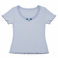 Front flat lay of the blue Two Moody Originals: Floral Daydream Top with pointelle texture, scalloped lace, and three blue rose appliqués with a bow.