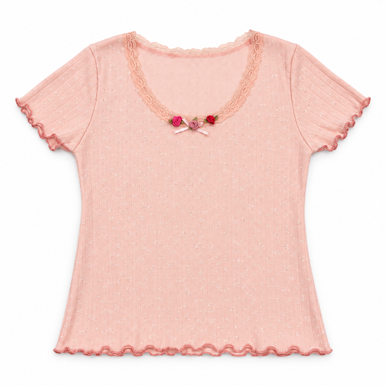Front flat lay of the pink Rosie Dreams Two Moody Originals: Floral Daydream Top – Local Stock with scalloped lace and pink and red rose appliqués and a bow.