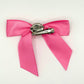 Back of the large decorated Two Moody Originals: Signature Bow Clips in the color pink, showcasing the alligator hair clip and brooch pin