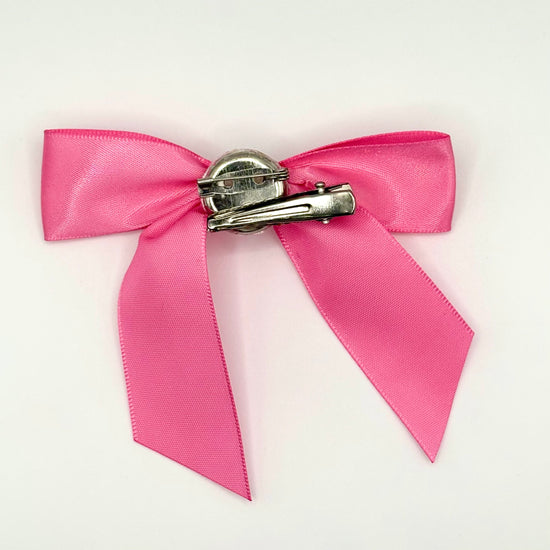 Back of the large decorated Two Moody Originals: Signature Bow Clips in the color pink, showcasing the alligator hair clip and brooch pin