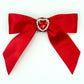 Front of the large decorated Two Moody Originals: Signature Bow Clips in the color red with a heart rhinestone center
