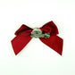 Back of the small classic Two Moody Originals: Signature Bow Clips in the color burgundy, showcasing the alligator hair clip and brooch pin