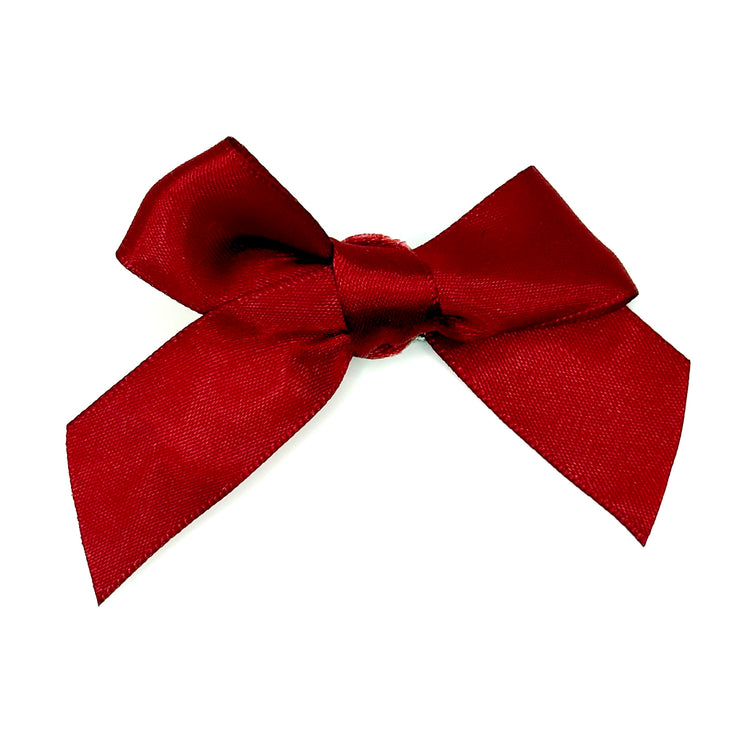 Front of the small classic Two Moody Originals: Signature Bow Clips in the color burgundy