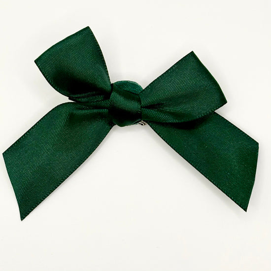 Front of the small classic Two Moody Originals: Signature Bow Clips in the color dark green