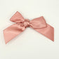 Front of the small classic Two Moody Originals: Signature Bow Clips in the color dusty rose