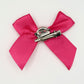 Back of the small classic Two Moody Originals: Signature Bow Clips in the color hot pink, showcasing the alligator hair clip and brooch pin