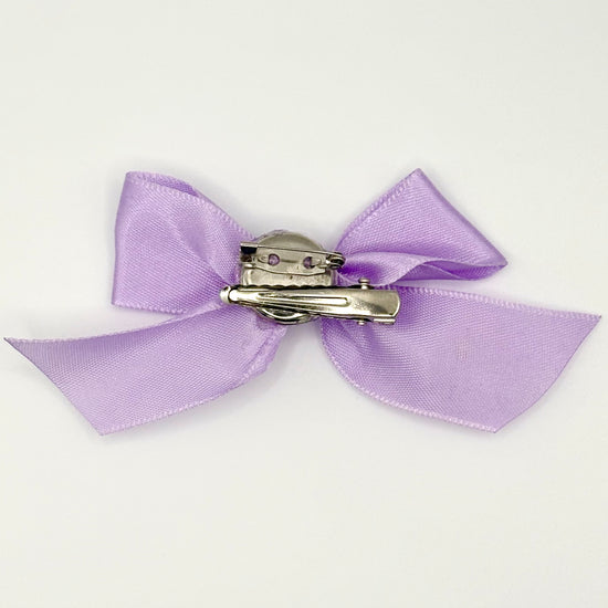 Back of the small classic Two Moody Originals: Signature Bow Clips in the color lavender, showcasing the alligator hair clip and brooch pin