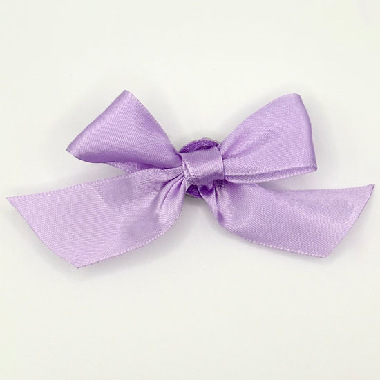 Front of the small classic Two Moody Originals: Signature Bow Clips in the color lavender