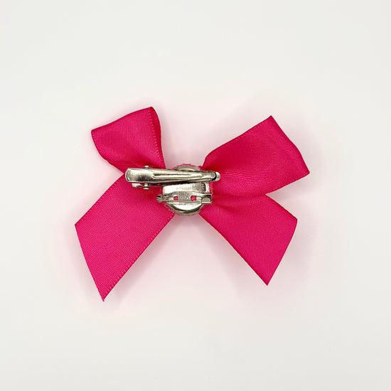 Back of the small decorated Two Moody Originals: Signature Bow Clips in the color hot pink with light pink rose, showcasing the alligator hair clip and brooch pin