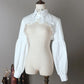 Front view of the white Ultra Cropped Layering Blouse displayed on a mannequin.