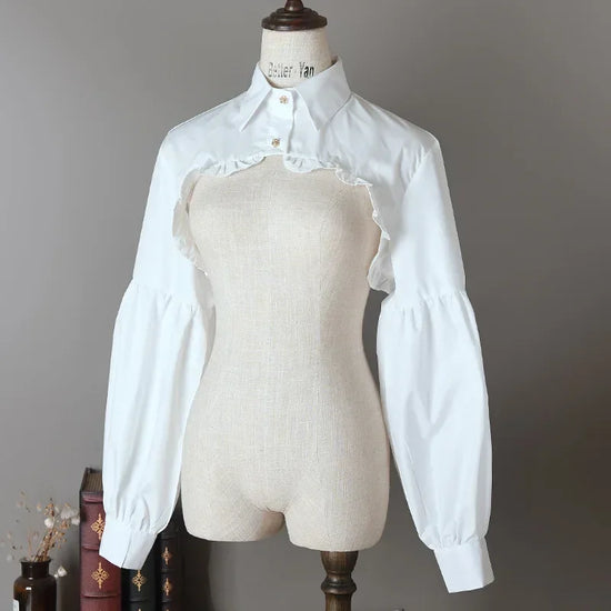 Front view of the white Ultra Cropped Layering Blouse displayed on a mannequin.