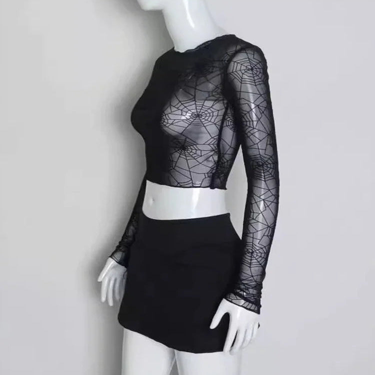Side view of the Web of Shadows Mesh Top, displaying the sheer spiderweb mesh, slim fit, and cropped silhouette.