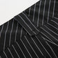 Close-up of Y2K Business Chic Trousers belt loop on black pinstriped fabric