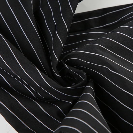 Y2K Business Chic Trousers fabric stretch close-up showing soft polyester material