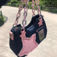 Side-angle view of the Y2K Harajuku Star Denim Chain Bag in dark blue showing the pink star appliqué, chunky chain handle, zipper, and shoulder strap.