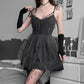Model wearing Dark Fairy Tulle Dress styled with long black arm warmers indoors