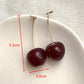 Size dimensions of the large, dark red Sweet Cherry Earrings displayed