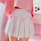 Close-up of pink ribbon bow detail on the Sweetheart Academy Skort