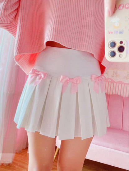 Close-up of pink ribbon bow detail on the Sweetheart Academy Skort