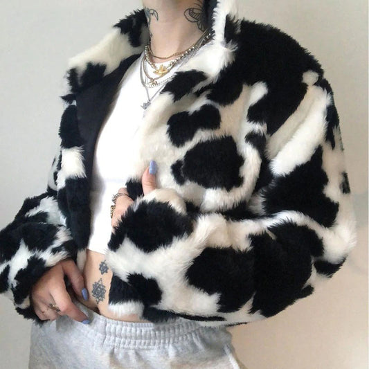 Model styling Udderly Wild Jacket open, revealing outfit underneath and oversized collar